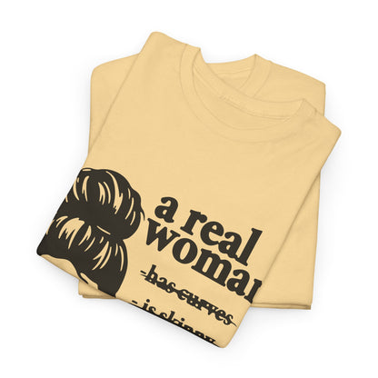 Empowering Women Unisex Heavy Cotton Tee - 'A Real Woman Is Whatever The Hell She Wants To Be'